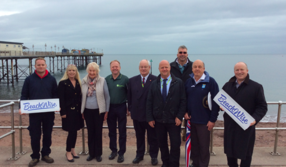 Representatives of the Love Your Beach group are all smiles at Teignmouth Town Beach.