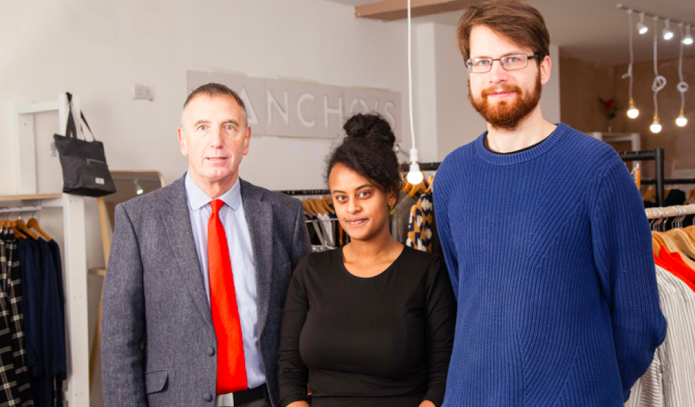 Brian Steer of SWIG Finance, left, with Kalkidan Legess and Vidmantas Markevius