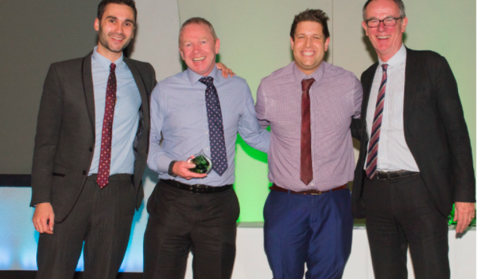 Martin Keatch (middle left) from Forest Fuels and Martin Jarman pick up the Green Energy Award from Joe Selamn Levea and Lord Teverson
