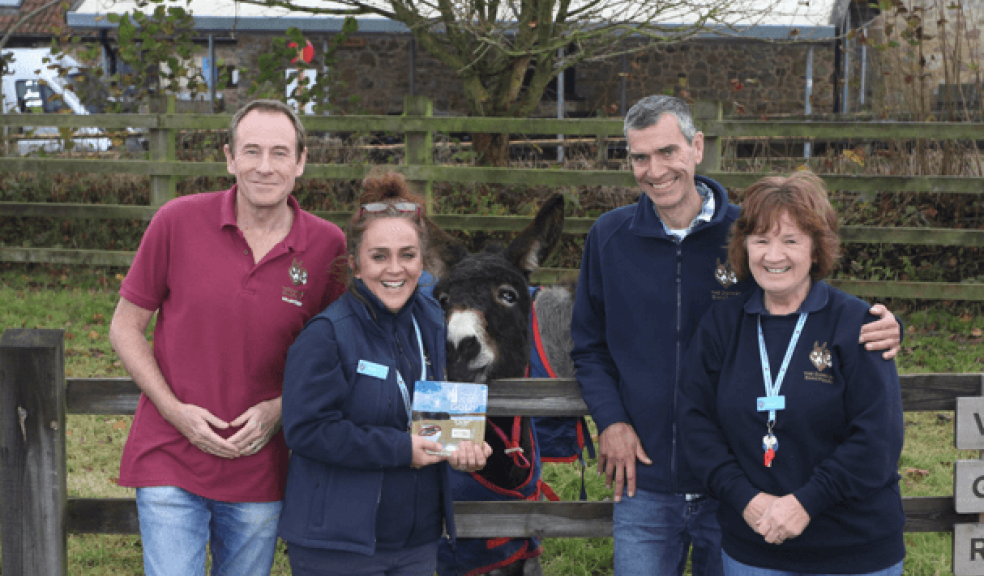 Hardy the donkey with Hardy, with (l-r) volunteer Phil Dawson, visitor services assistant Donna Roberts-Trevett, visitor engagement manager John Crouch and visitor services assistant Lynne Blair.