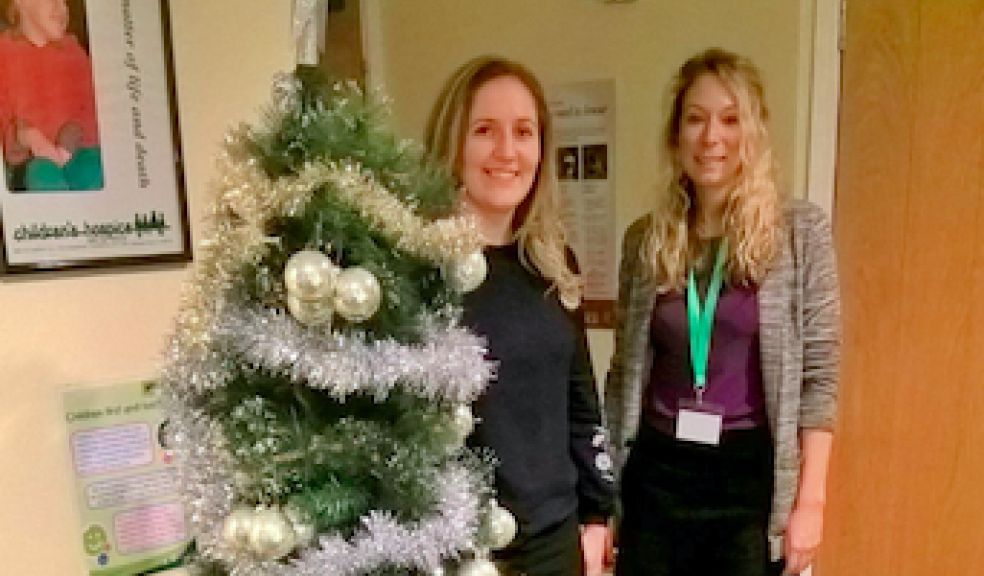 LtoR: Emma Champion from RGB Building Supplies and Mhairi Bass-Carruthers, CHSW Corporate Partnerships Fundraiser, with some of the donated gifts.