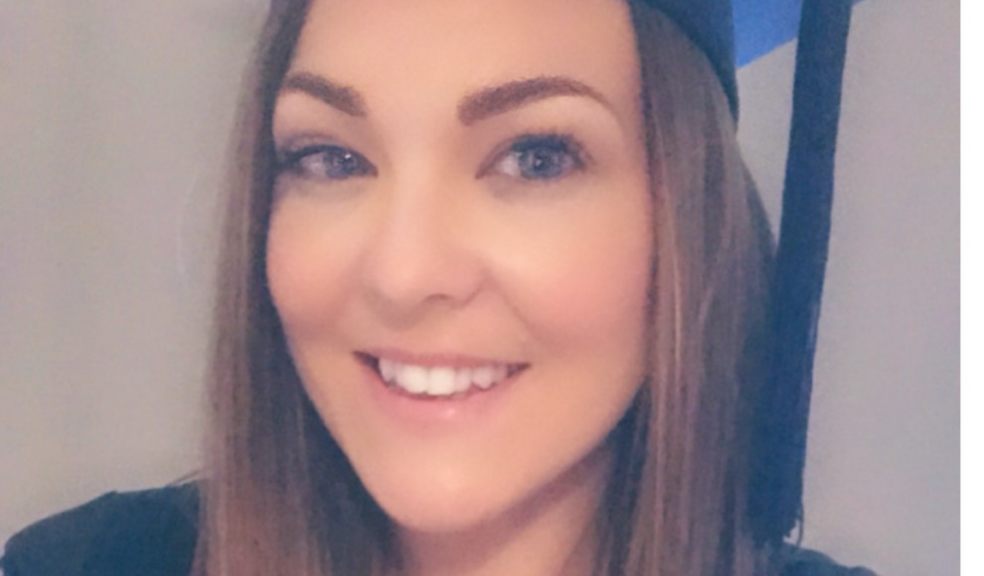 Amy Joint with her mortarboard