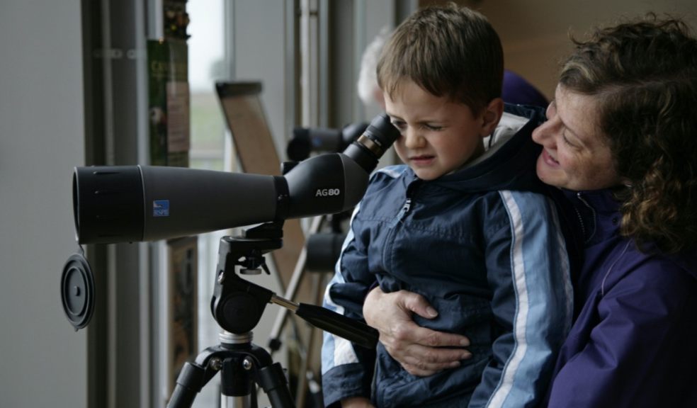 Mum and son trying out telescope by Andy Hay (rspb-images.com)