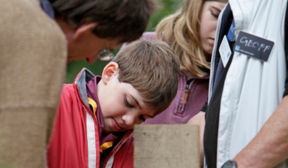 Photo Credit: family making a nestbox with an RSPB volunteer by Andy Hay (rspb-images.com)