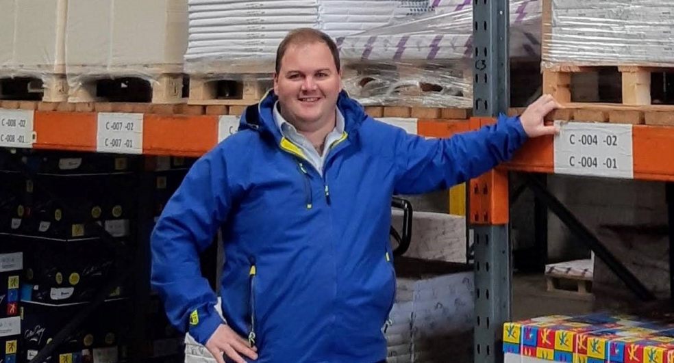 Simon Besley, Sales and Marketing Manager of Newton Print with some of their stock ready for Christmas demand.