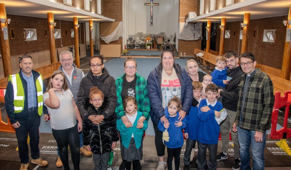 L-R - David Hawker from Dodd Group, Andy Butt from JK Floorheating, local families who attend services and sessions in the church, and the Reverend Carl Robinson. L-R - David Hawker from Dodd Group, Andy Butt from JK Floorheating, local families who attend servic