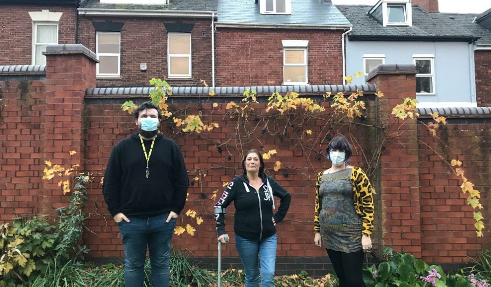 Staff member Sean Birmingham, resident Val and staff member Karraleigh Wellington