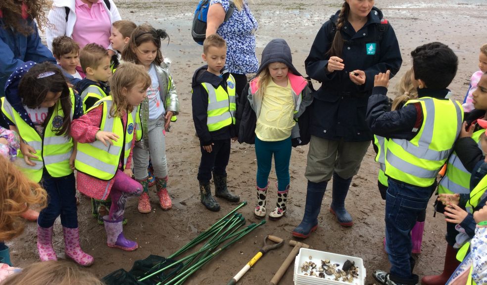 Stephanie Clarke from Exe Estuary Management Partnership with Emerald Class at Exmouth Nature Reserve.
