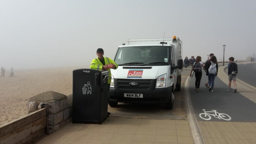 Gordon Brown is pictured by the bin with his melt-in-the-mouth reward.