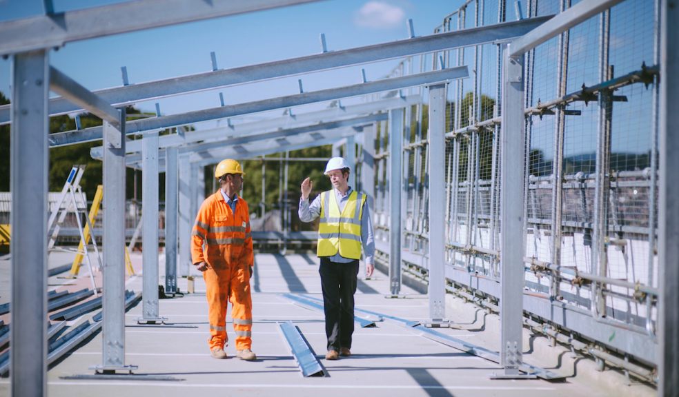 SunGift founder Gabriel Wondrausch (left) explains some of the finer details about the UK's first multi-storey car park solar carports.