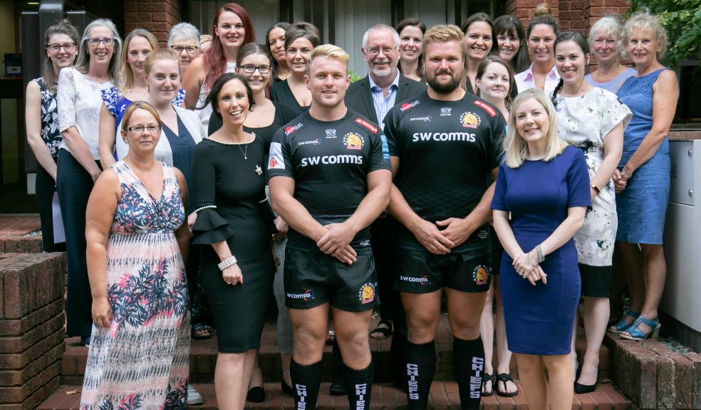Jack Innard and Tomas Francis with staff at The Family Law Company