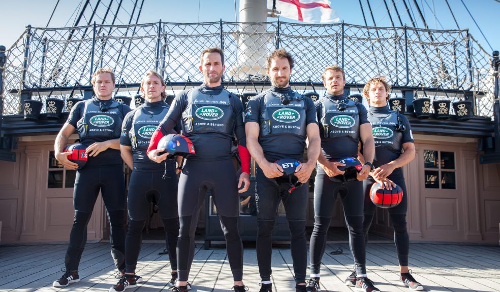 Crest of a wave: The Land Rover BAR team led by Sir Ben Ainslie (third left).