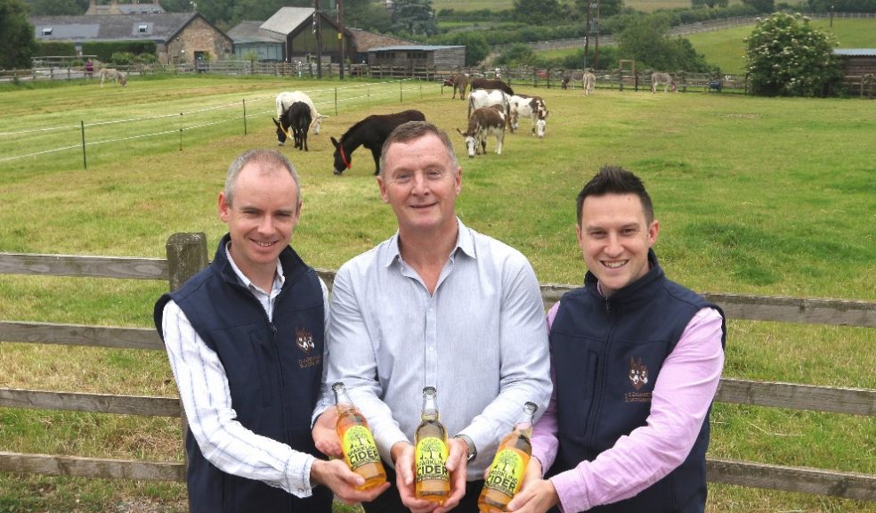 Pictured with Lyme Bay Winery’s Bob Harding (centre) is Ben Winnard – Retail and Catering Operations Manager (left) and James Searle – Head of Commercial Activities (both from The Donkey Sanctuary).
