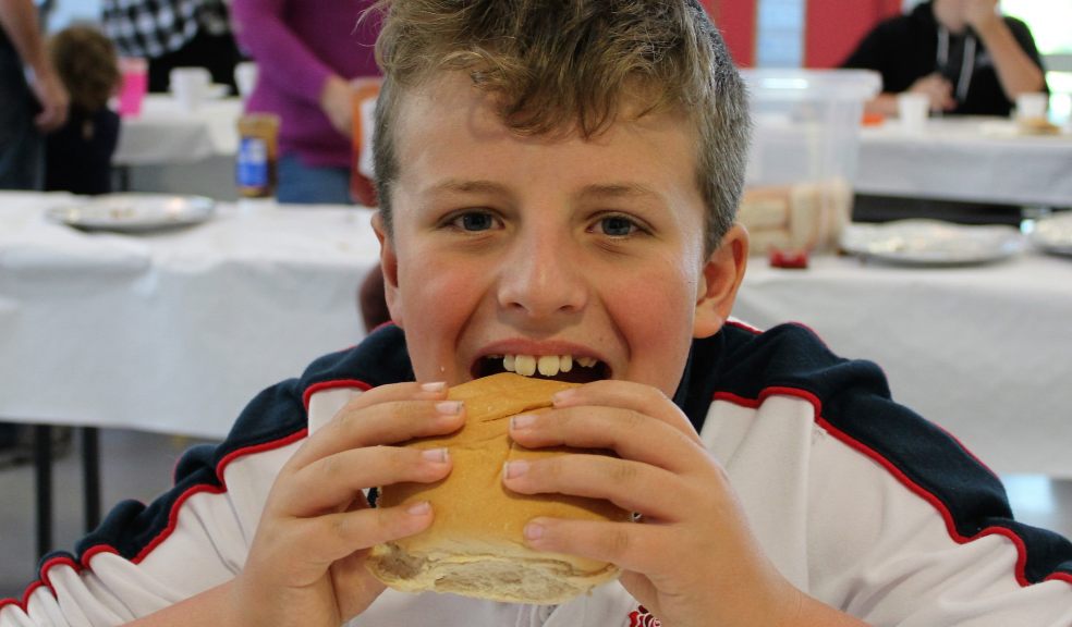 Tom tucking in
