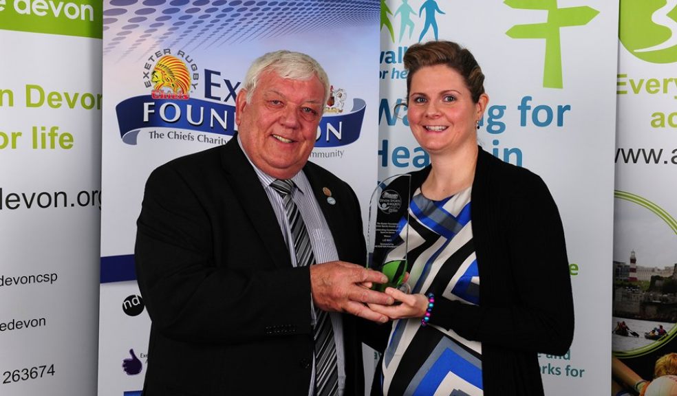 Tony Rowe presents Liz May with her award