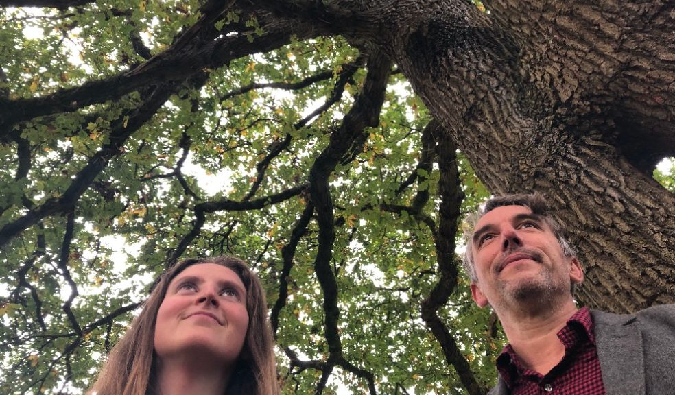 Cllr Josie Parkhouse, Lead Councillor for Climate Change and Ecological Crisis admiring an ancient oak tree in Mincinglake Valley Park alongside Treeconomics’ Ben Coles. Image courtesy of Exeter City Council.