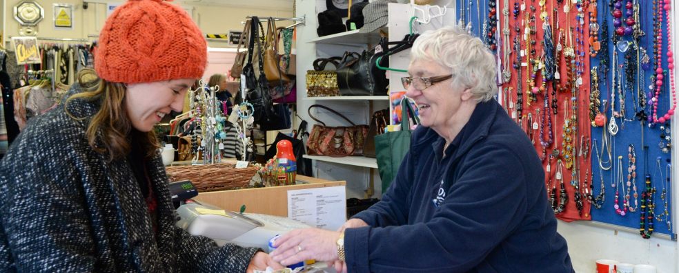 FORCE Shop volunteer Moira Reid at the till