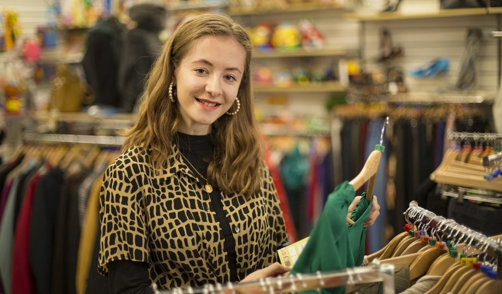 Exeter University student Niamh O'Riordan-Mitchell volunteers in the Children’s Hospice South West charity shop in Sidwell Street, Exeter. Picture: Tim Lamerton Photography 