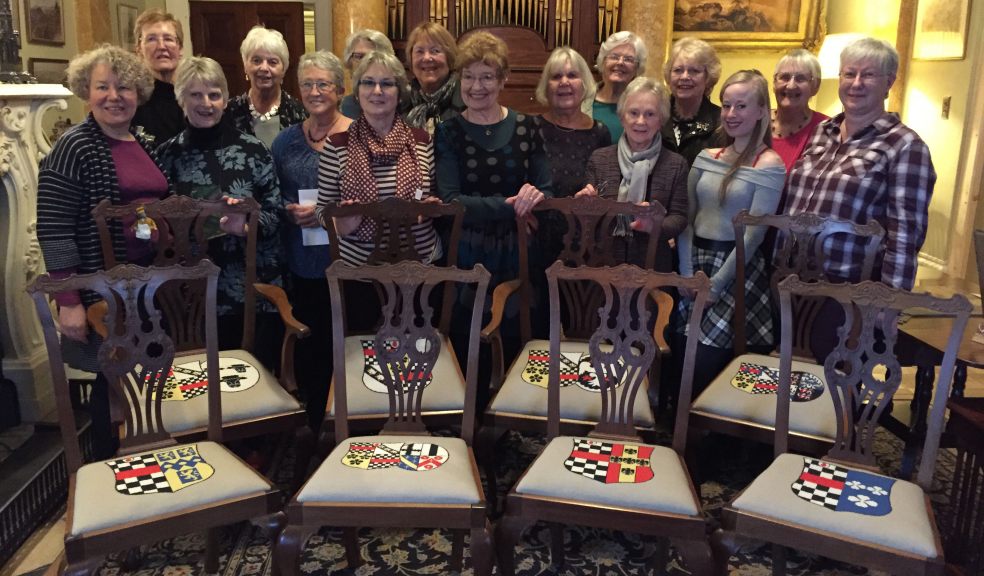 Volunteers with some of the chairs. Credit Malcolm Jarvis.