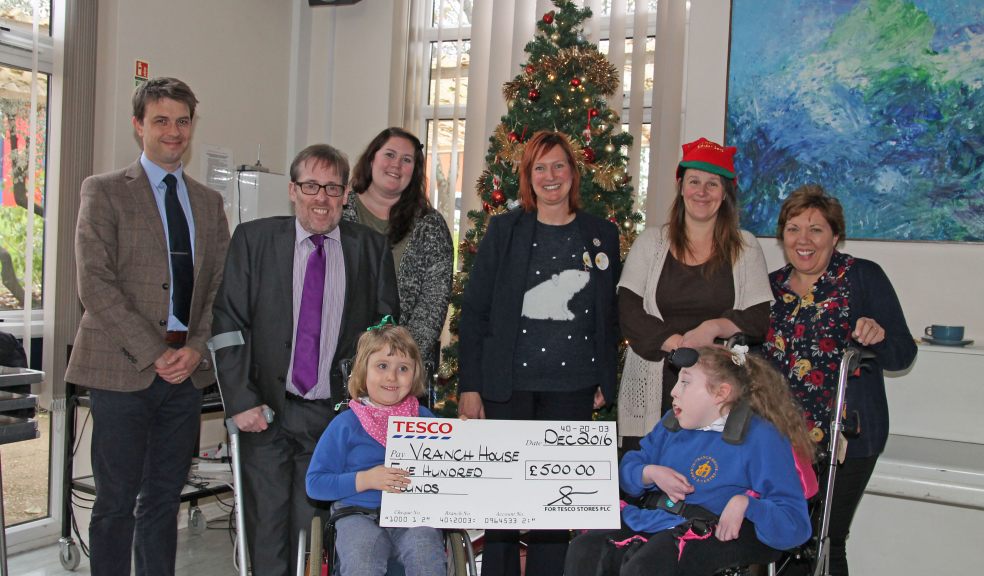 Faith and Bethany with Ian Norton, Kate Moss, Ruth Whitthorn, Zoe Letten and Andrew Barge of Vranch House, and Jo Evans, Community Champion from Tesco