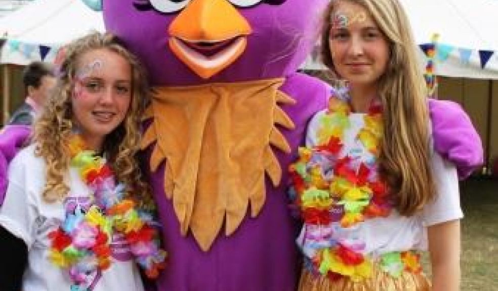 Twilight Walk mascot Ella the Owl with her fans