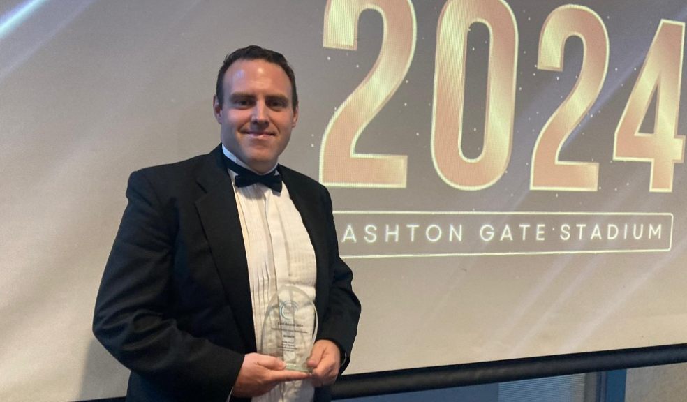 Andy Hood of Westbanks Devon Carers receiving his award in Bristol.j