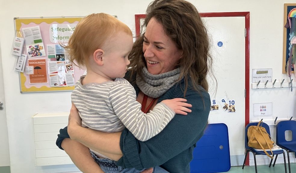 Westbank's Kidzone Childcare Manager Lucy Elliott with one of the toddlers