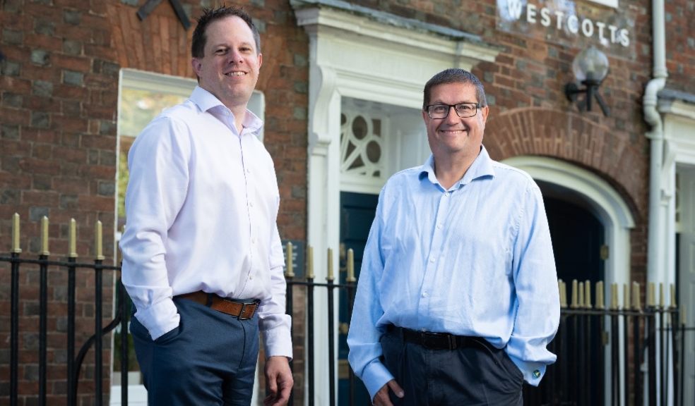 Mark Tibbert (left) welcomes Jon Sparkes to Westcotts.