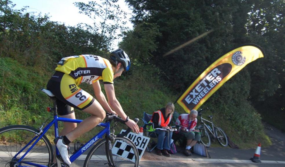 An Exeter Wheelers rider crossing the finish line