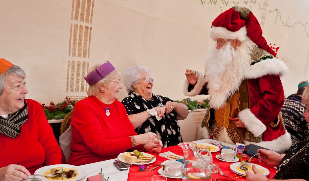 The Bicton Santa with three of our lady guests