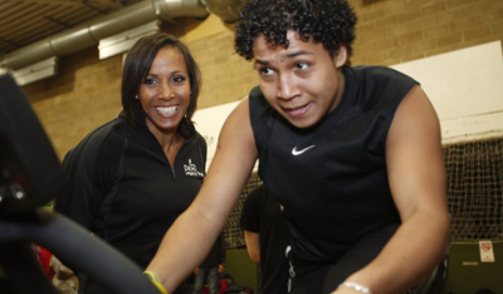 Dame Kelly Holmes with 'Get on Track' participant