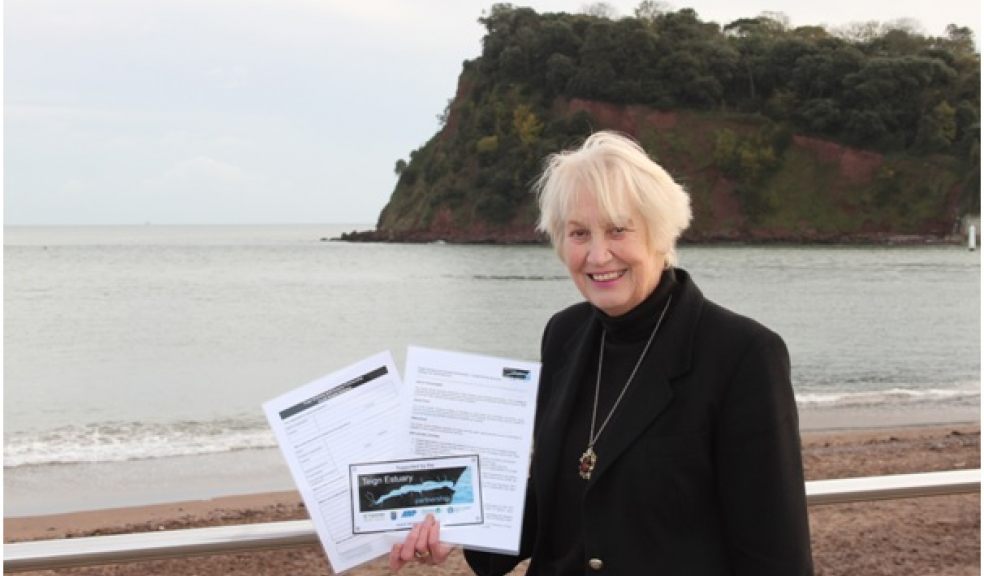 • Cllr Sylvia Russell, Chairman of the Teign Estuary Partnership, with the small grants application form