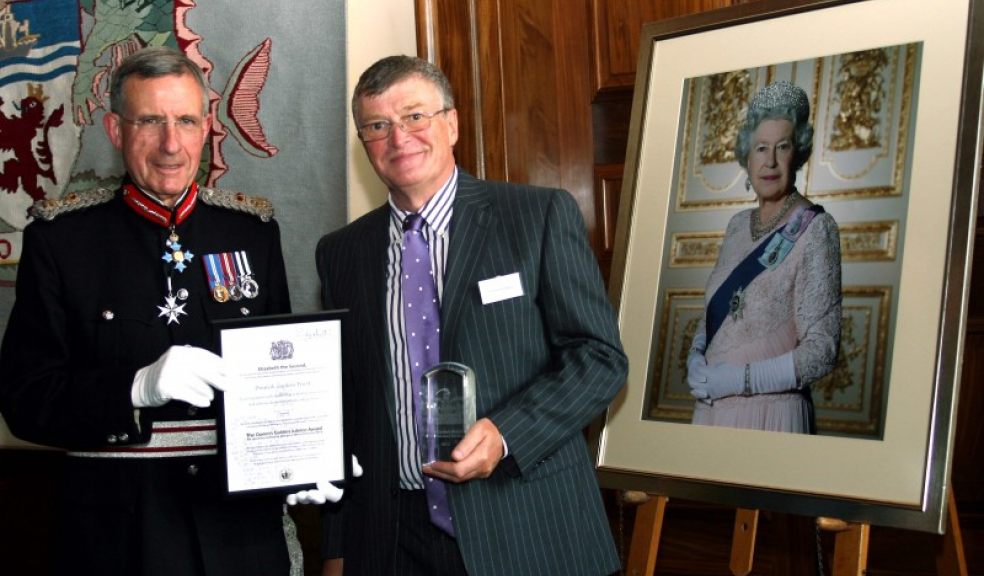 The Lord Lt of Devon, Eric Dancer presents the Queen’s Award to Dr John Whitehead representing the Dawlish Gardens Trust