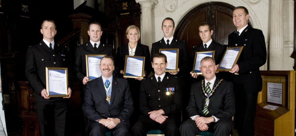 Front row L-R Lord Mayor Cllr Rod Newby, Supt Chris Eastwood, Mayor of Exmouth Cllr John Humphreys Back row L-R PC Phil Wilson, PC James MacKay, DC Allison Berry, PC Michael Harper, PCSO Justin Willis, PC Martin Young