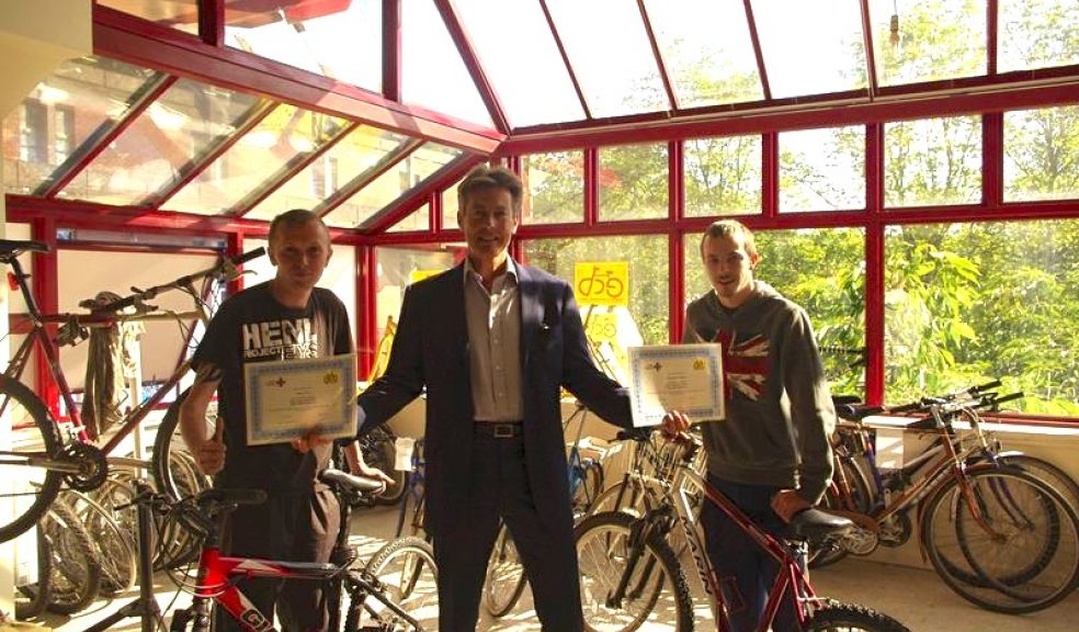 MP Ben Bradshaw presents certificates to trainees Jamie Nix and Graham Swinbank
