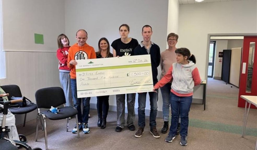 Photo caption: Jo Towns, Marketing Manager at Barratt David Wilson Homes Exeter, presents a cheque to D'Arts Exeter.