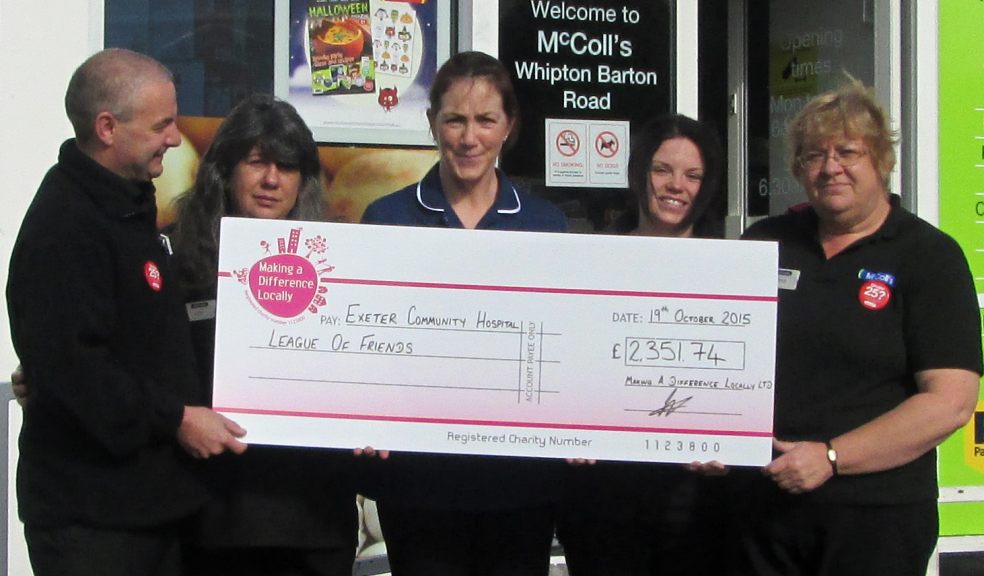 STAFF from McColl’s present the cheque to Cathy Varetto, deputy matron at Exeter Community Hospital, outside the company’s store in Whipton Barton Road. Pictured with Cathy (centre) are (from left) Colin Goulder, Julie Thompson, Sarah Lord and Brenda Willis.