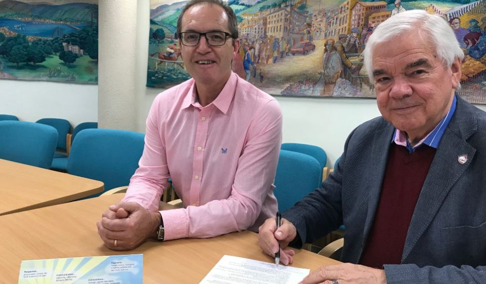 Teignbridge's Managing Director Phil Shears, left, and Council Leader Cllr Gordon Hook sign the Devon Climate Declaration Teignbridge's Managing Director Phil Shears, left, and Council Leader Cllr Gordon Hook sign the Devon Climate Declaration