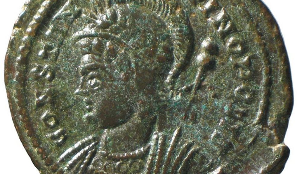 One of the 22,000 coins in the Seaton Down Hoard and the millionth object recorded on the PAS database: a copper alloy coin struck by Constantine I to celebrate his new city of Constantinople (Istanbul), struck at Lyon in AD 332. The obverse shows the personification of Constantinopolis. © The Trustees of the British Museum
