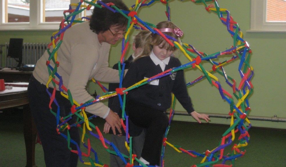 Two pupils enjoying Dr Lea's 'Cool Maths Show'