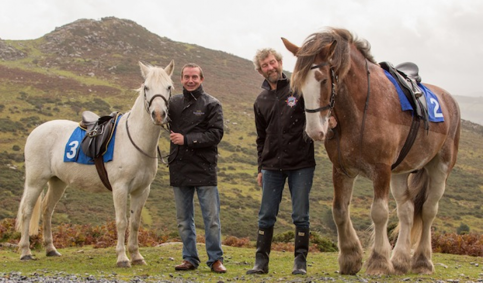 The Clydesdale is last year’s race winner Tom Parker pictured with Tim Darby, Exeter Racecourse general manager (left) and Tim Ancrum, owner of Adventure Clydesdales