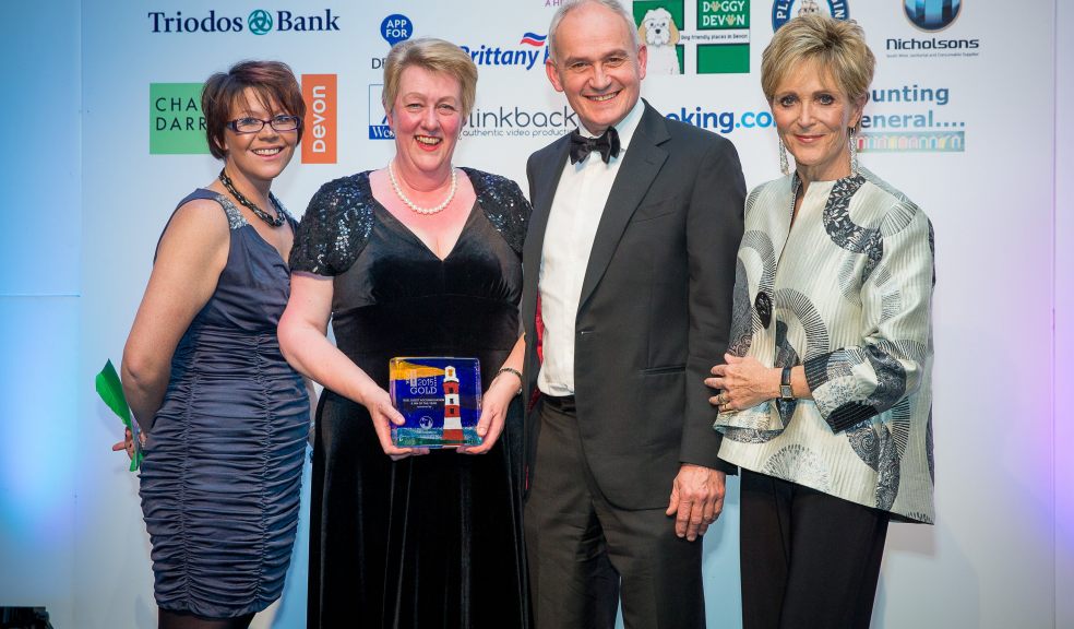 Sally Glanvill proudly displays the Gold Award at the Devon Tourism Awards 2015