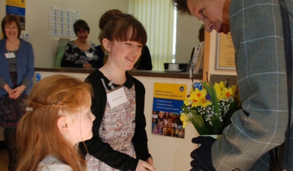 Phoebe Poulton, 9, and Allanah Cocker, 5, present a posy to The Princess Royal