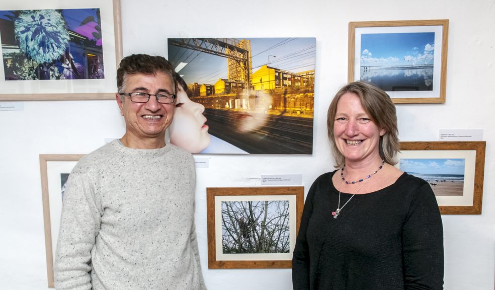 Ismat Almahmada beside his work and Tat Ruck from Devon Grapevine at the exhibition launch - Clive Chilvers/Devon Grapevine/Meridian Raw