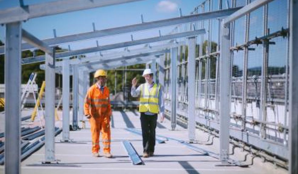 SunGift founder Gabriel Wondrausch (left) explains some of the finer details about the UK's first multi-storey car park solar carports.