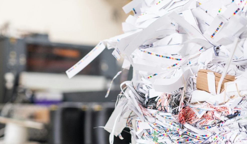 Close-up of cut papers heap produced with linotype machine at printing house