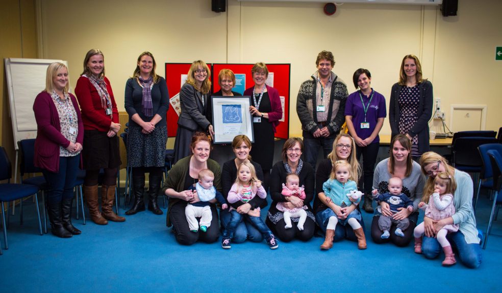 Jayne Carroll, Head of Integrated Children's Services with staff from Devon's health visiting service, breastfeeding peer supporters and local mums at Chestnut Children's Centre, Exeter