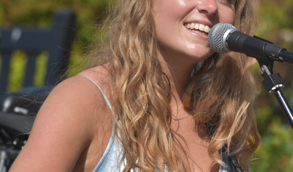 Busker Sadie Horler, pictured playing in Topsham