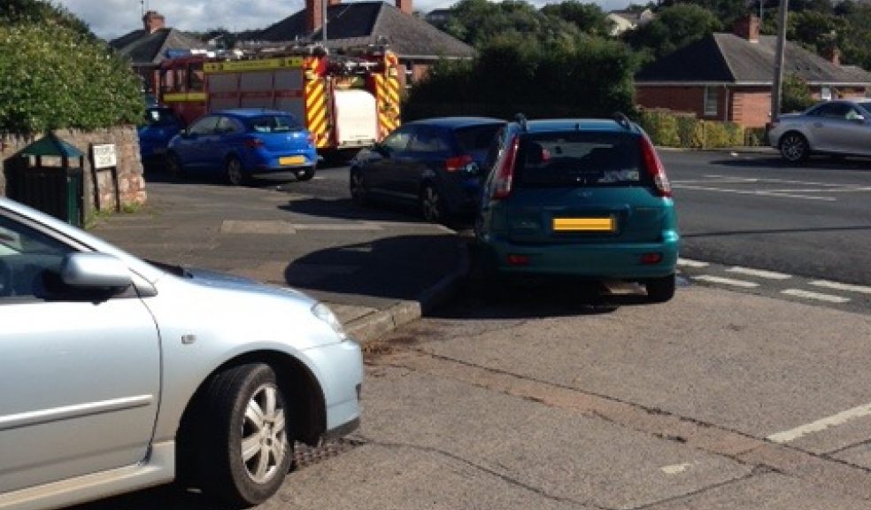 Example of bad parking, on the corner in front of dropped kerb