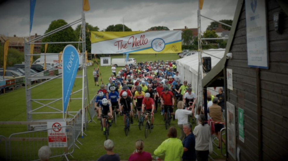 Riders line up for the start of the Nello